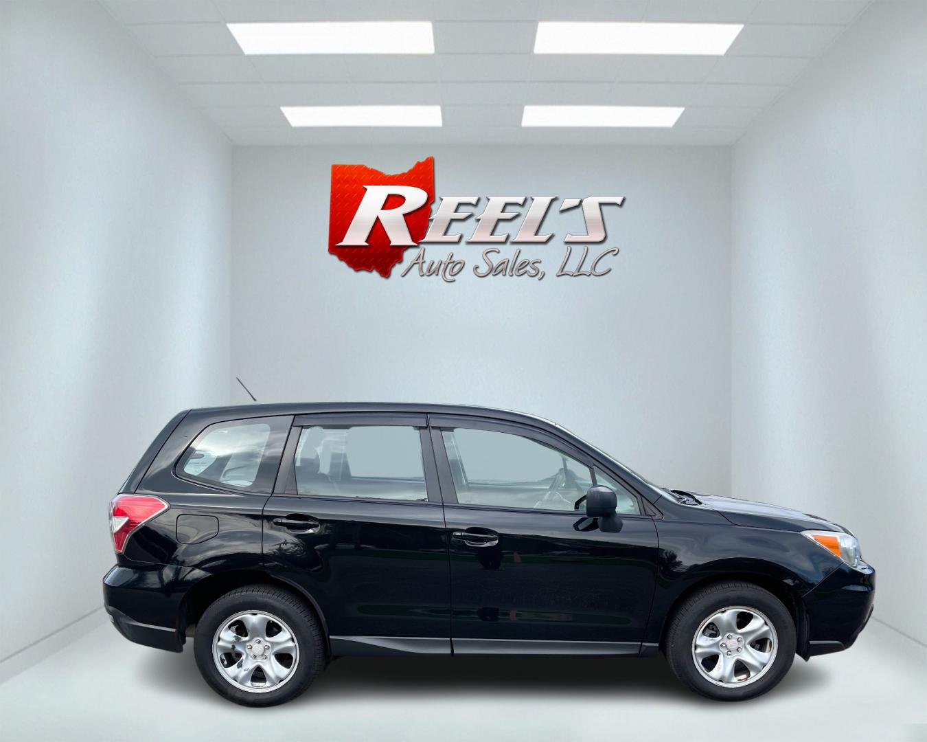 2015 Black /Black Subaru Forester 2.5i (JF2SJAAC1FH) with an 2.5L H4 SOHC 16V engine, Automatic transmission, located at 11115 Chardon Rd. , Chardon, OH, 44024, (440) 214-9705, 41.580246, -81.241943 - Photo#4